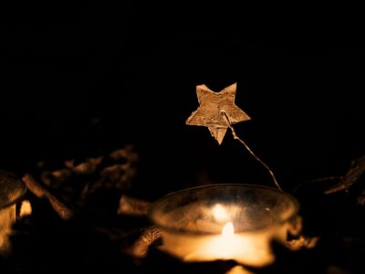 gold decorative christmas start and candle glow