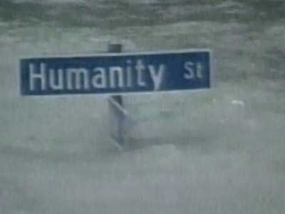 Street sign in flood waters